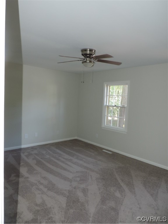 10616 Savoy Road North Chesterfield, VA 23235 - Photo 13 of 29 an empty room with windows and fan