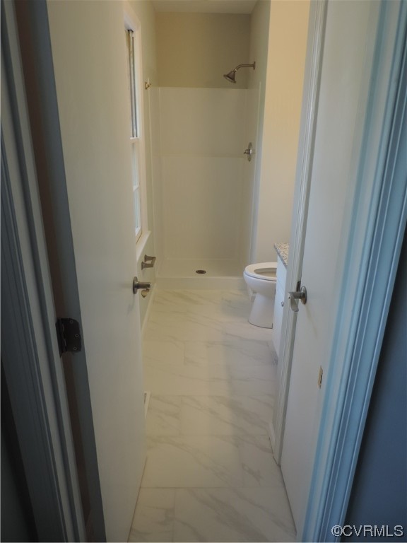 10616 Savoy Road North Chesterfield, VA 23235 - Photo 14 of 29 a bathroom with a sink and a shower