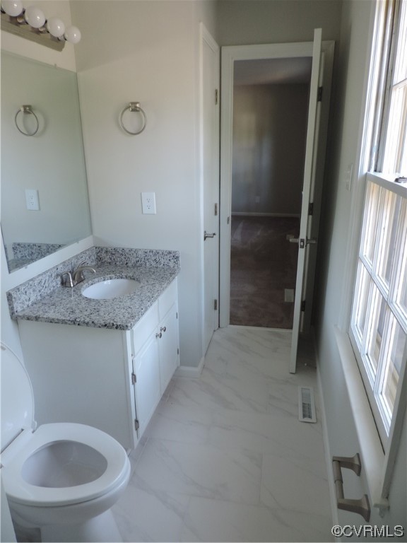 10616 Savoy Road North Chesterfield, VA 23235 - Photo 15 of 29 a bathroom with a granite countertop sink toilet and shower