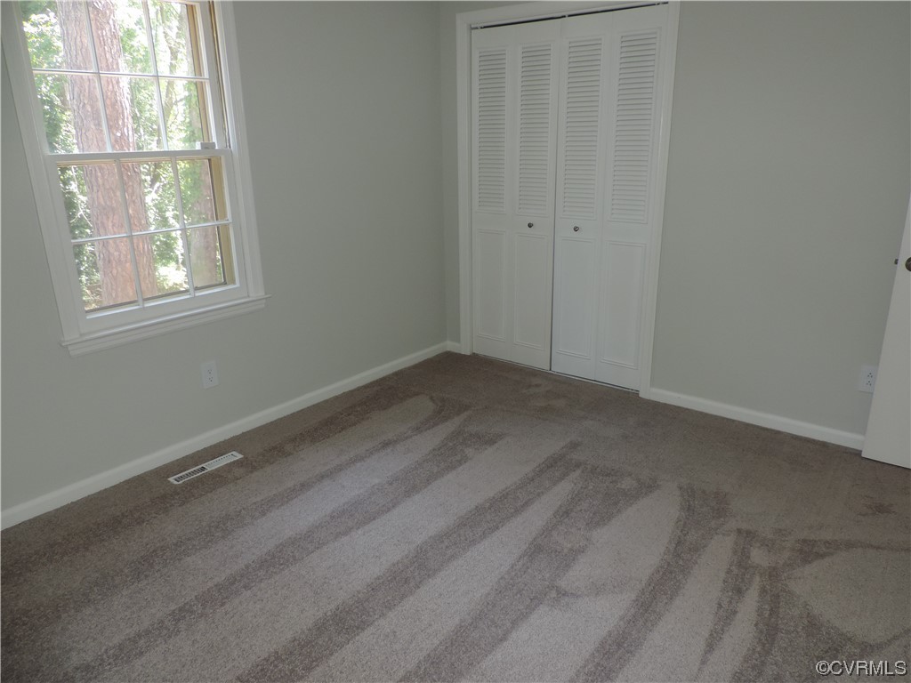 10616 Savoy Road North Chesterfield, VA 23235 - Photo 18 of 29 an empty room with windows