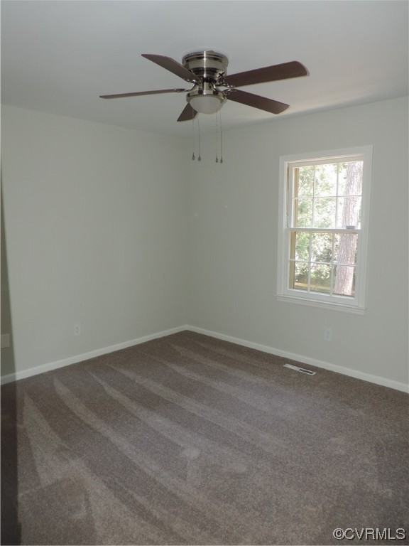 10616 Savoy Road North Chesterfield, VA 23235 - Photo 19 of 29 an empty room with a window and a fan
