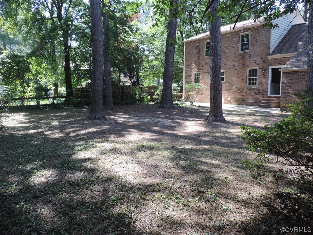 10616 Savoy Road North Chesterfield, VA 23235 - Photo 27 of 29 a view of a house with a yard