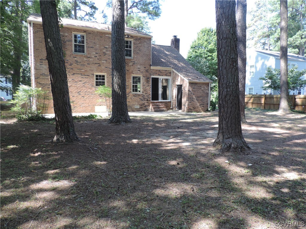 10616 Savoy Road North Chesterfield, VA 23235 - Photo 29 of 29 a view of a house with backyard and tree