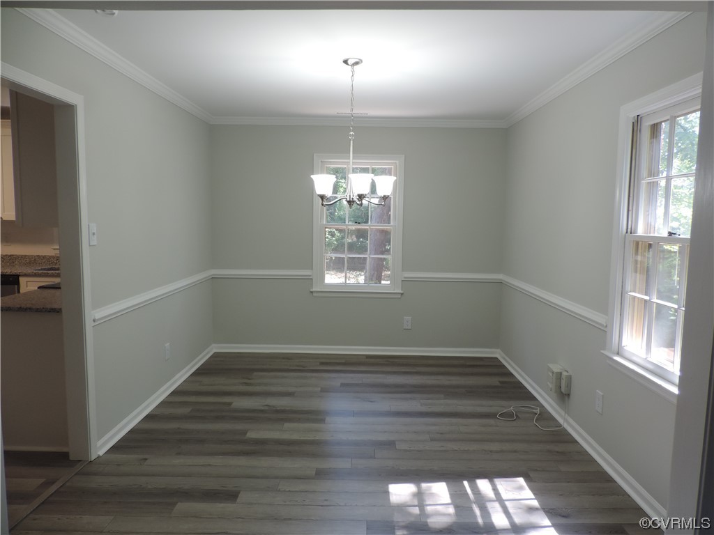 10616 Savoy Road North Chesterfield, VA 23235 - Photo 6 of 29 wooden floor in an empty room with a window
