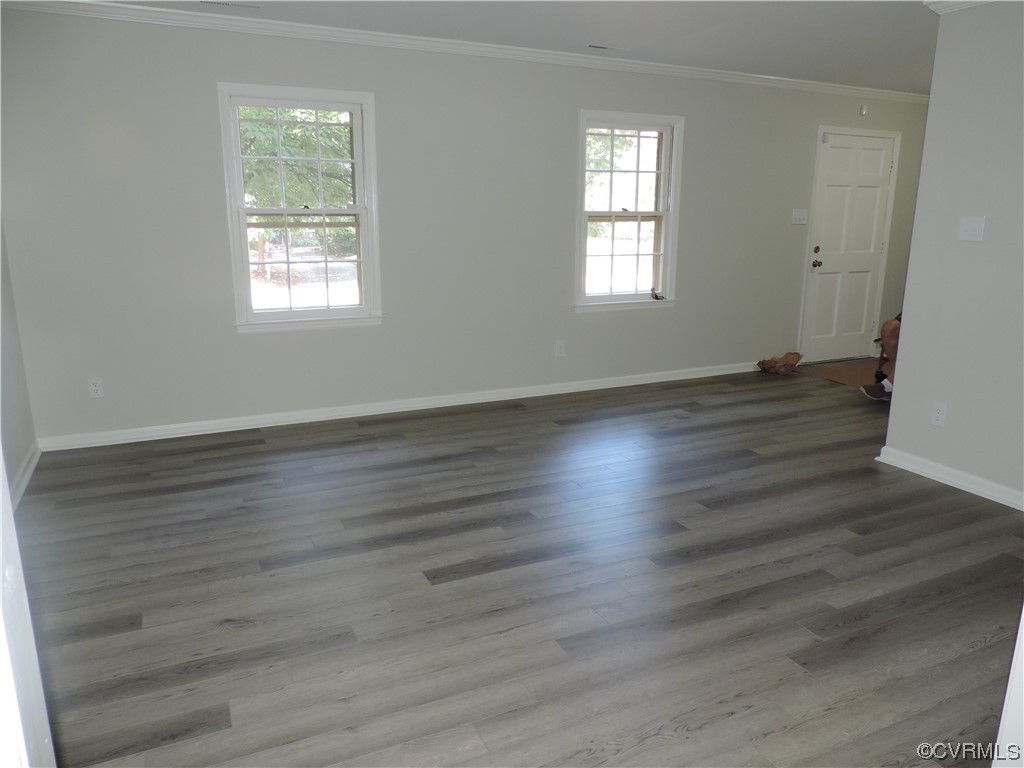 10616 Savoy Road North Chesterfield, VA 23235 - Photo 8 of 29 an empty room with wooden floor and windows