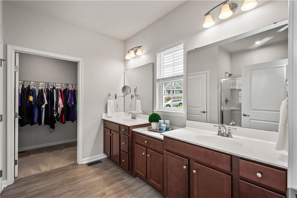 107 High Pointe Drive Washington, PA 15301 - Photo 20 of 38 a bathroom with a double vanity sink and a mirror