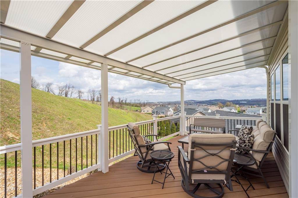 107 High Pointe Drive Washington, PA 15301 - Photo 5 of 38 a view of a city from a balcony with furniture