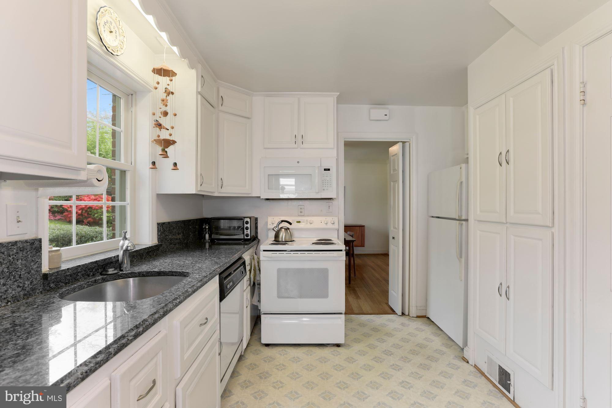 5615 Overlea Road Bethesda, MD 20816 - Photo 17 of 48 Bright and white kitchen, ample cabinet space.