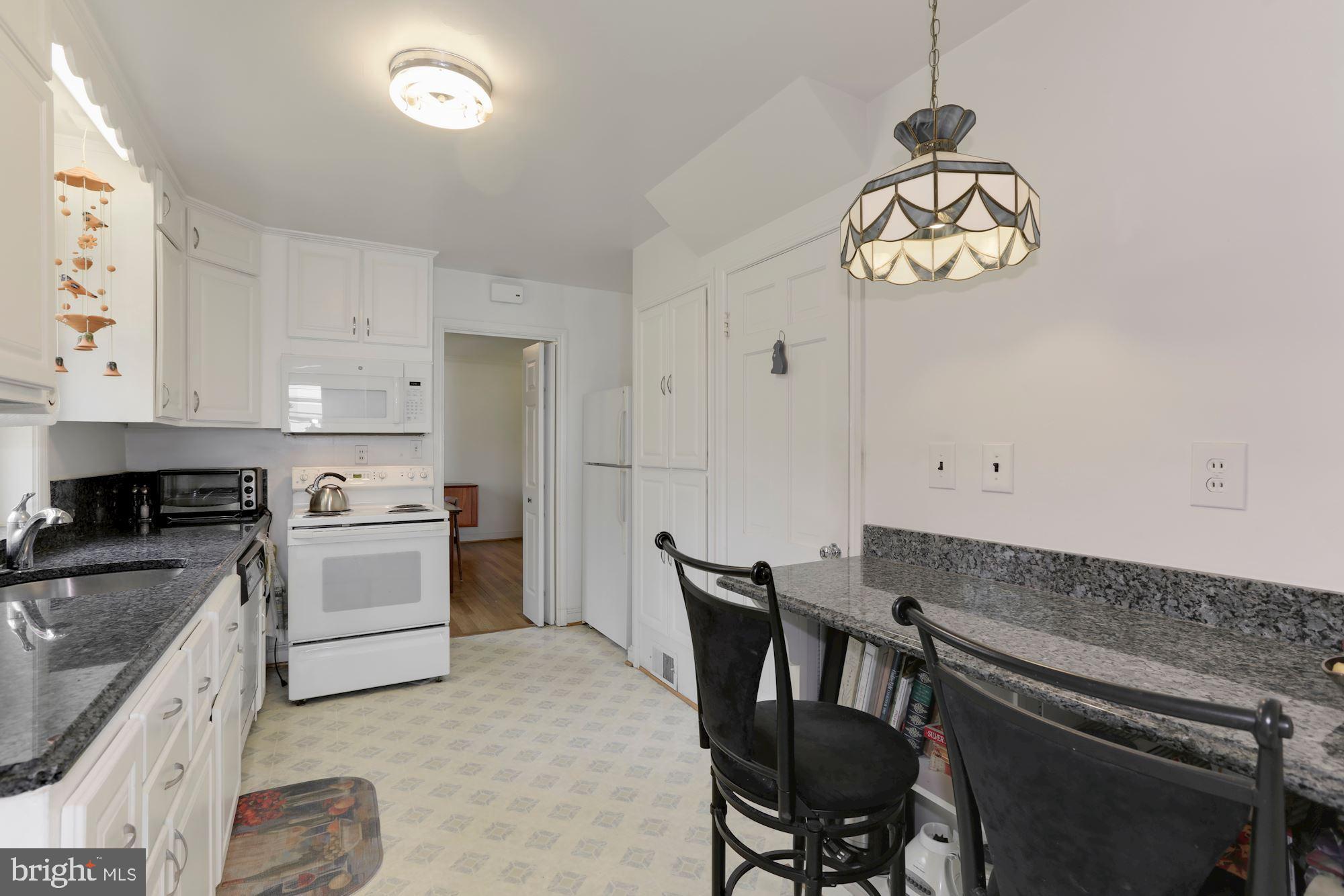 5615 Overlea Road Bethesda, MD 20816 - Photo 18 of 48 Kitchen, breakfast bar.