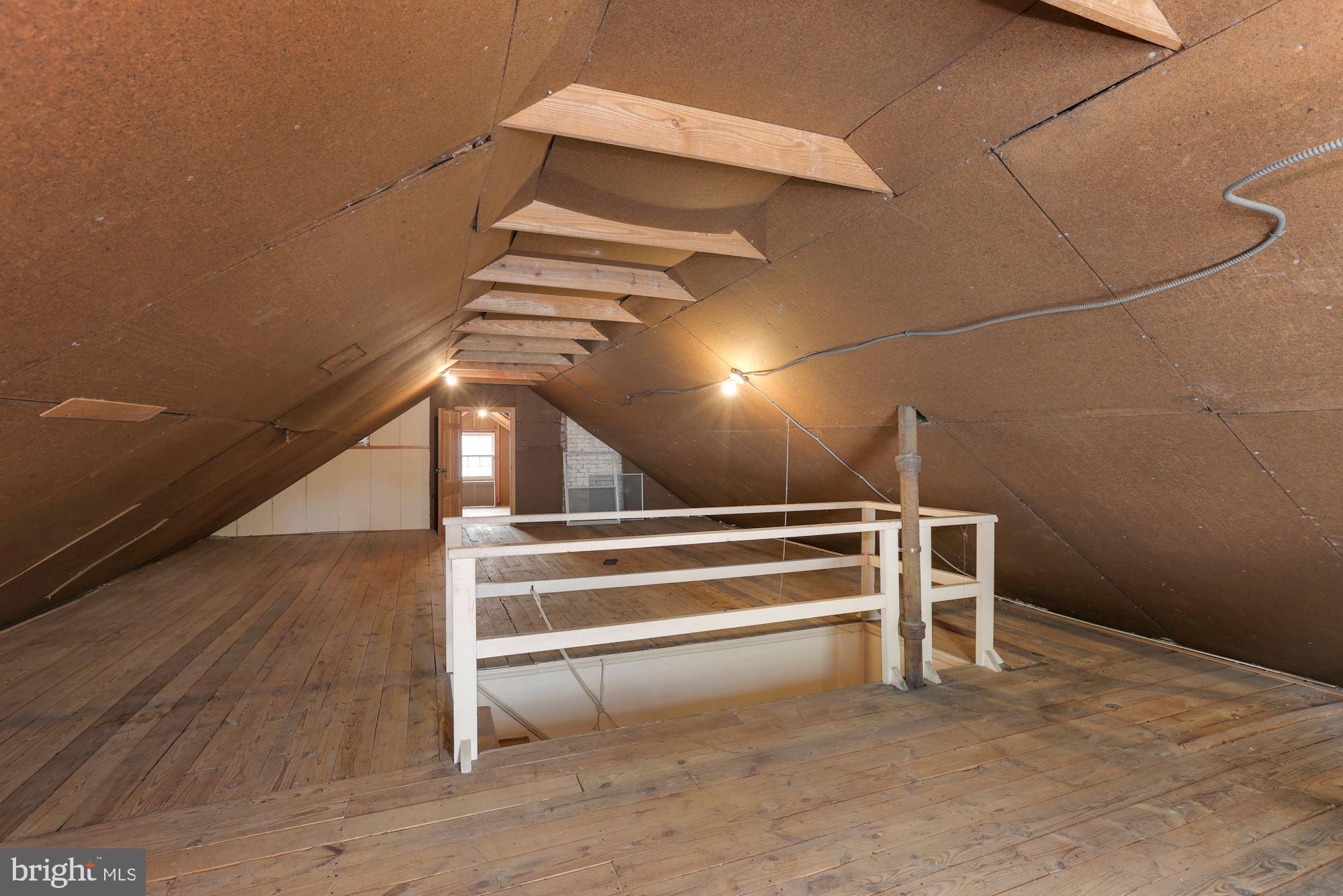 5615 Overlea Road Bethesda, MD 20816 - Photo 35 of 48 Unfinished attic storage area.