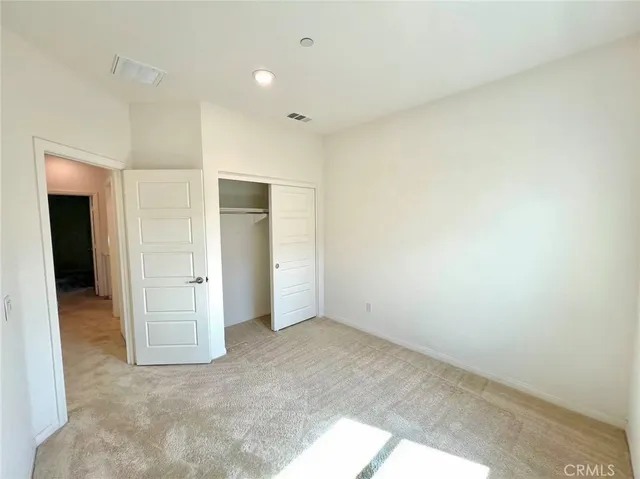 an empty room with closet