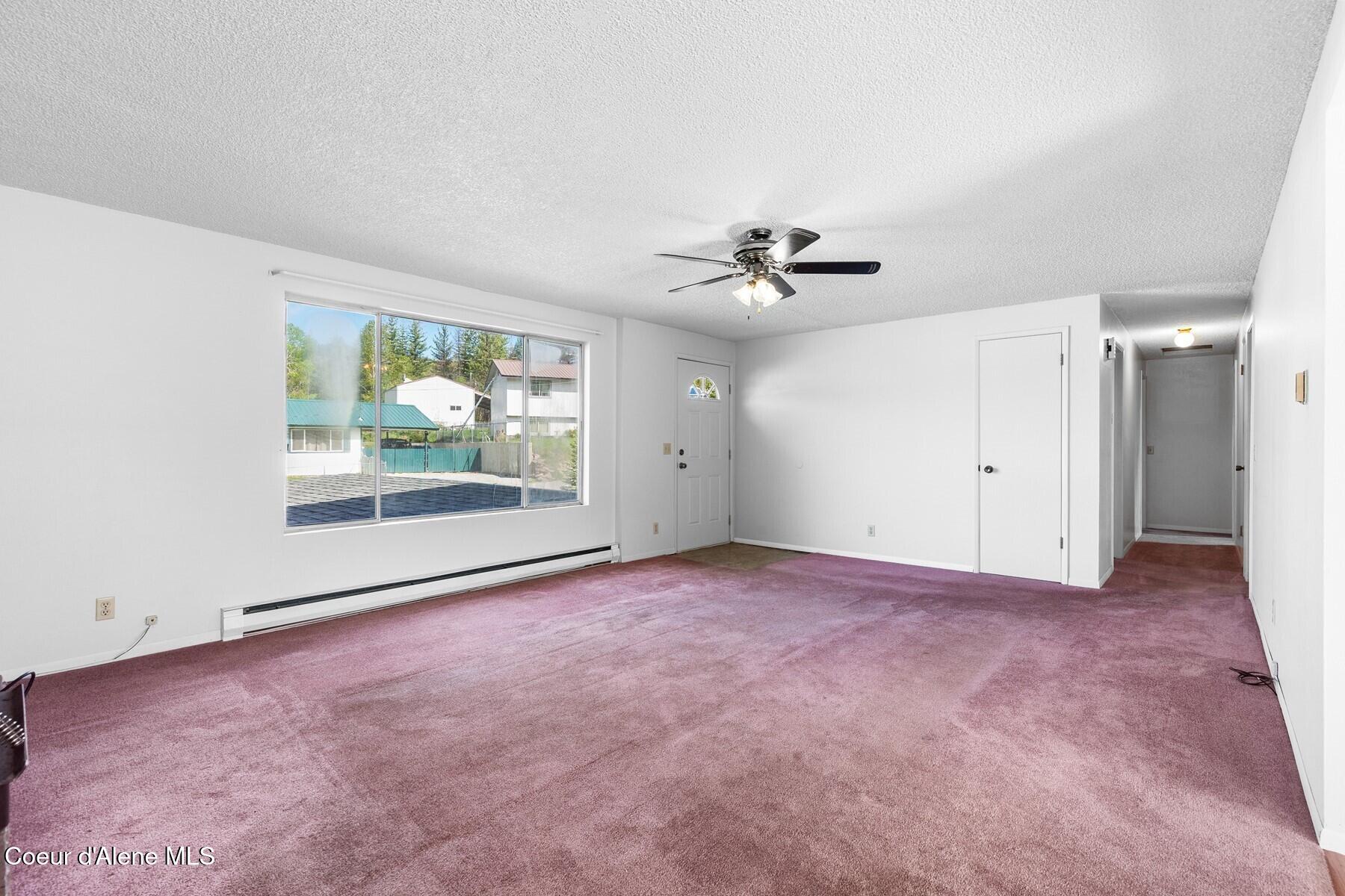 213 Rio Vista Street Osburn, ID 83849 - Photo 4 of 28 213RioVistaSt Family Room 3