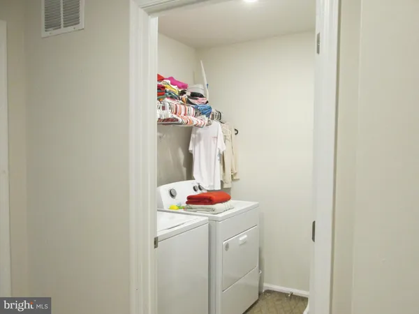 a bathroom with a sink and vanity
