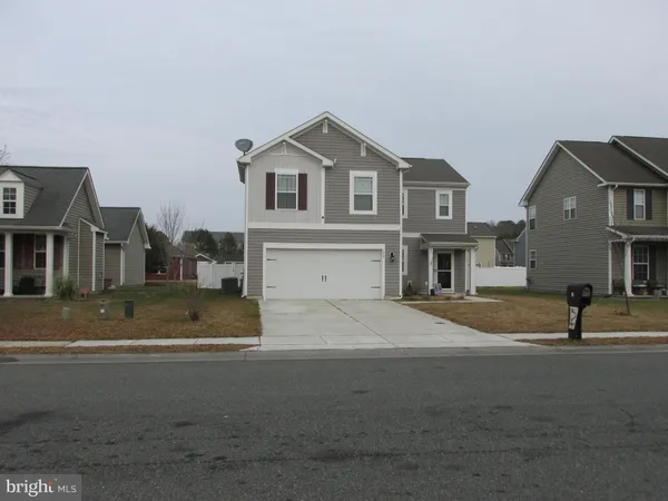 a view of street with houses