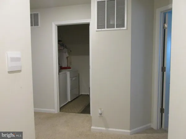 a view of hallway with stairs