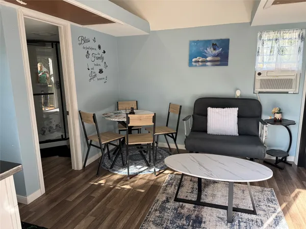 a view of a park with large trees