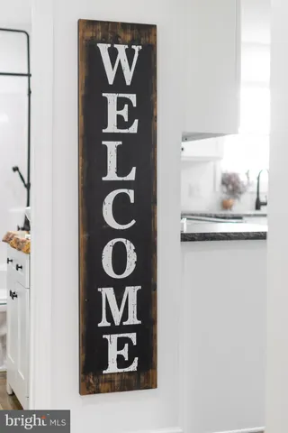 a blue bath tub sitting next to a window