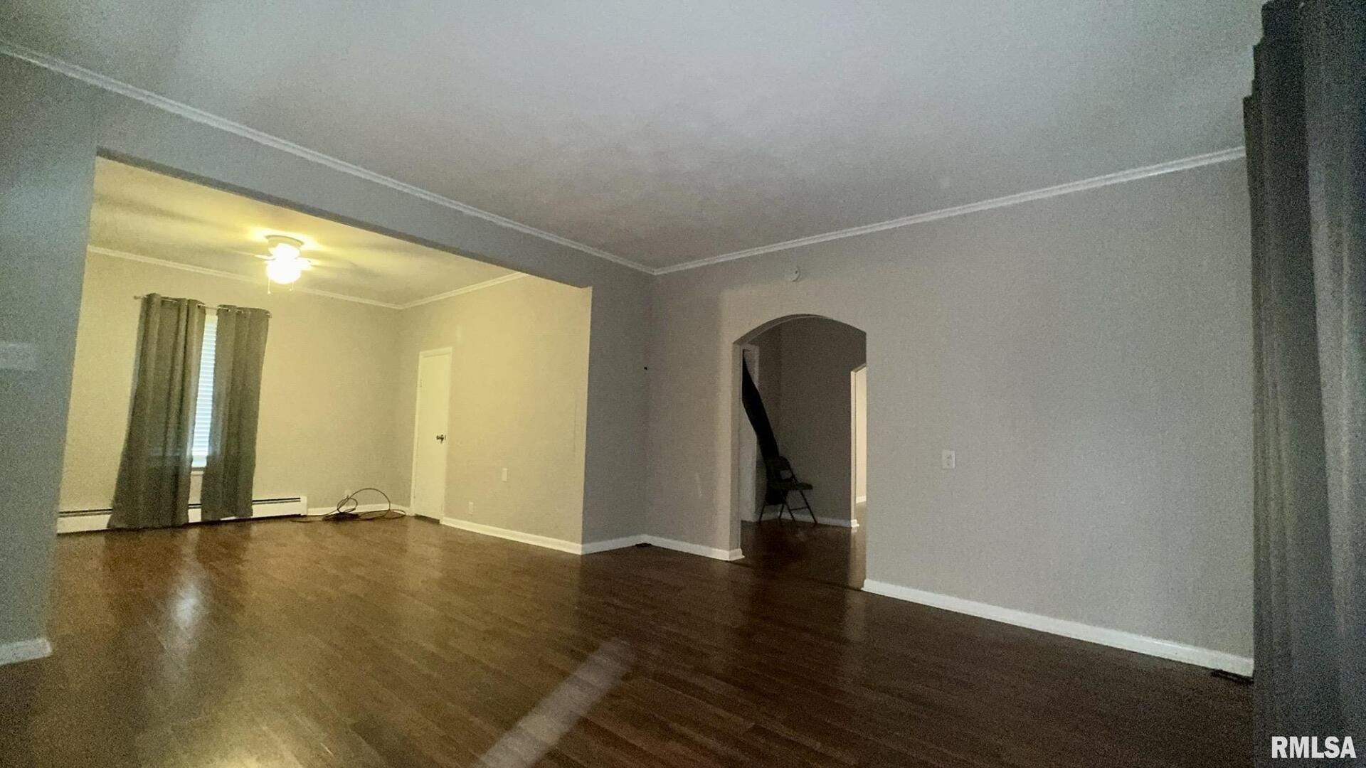 1206 South Main Street Benton, IL 62812 - Photo 10 of 23 a view of a room with wooden floor and a window