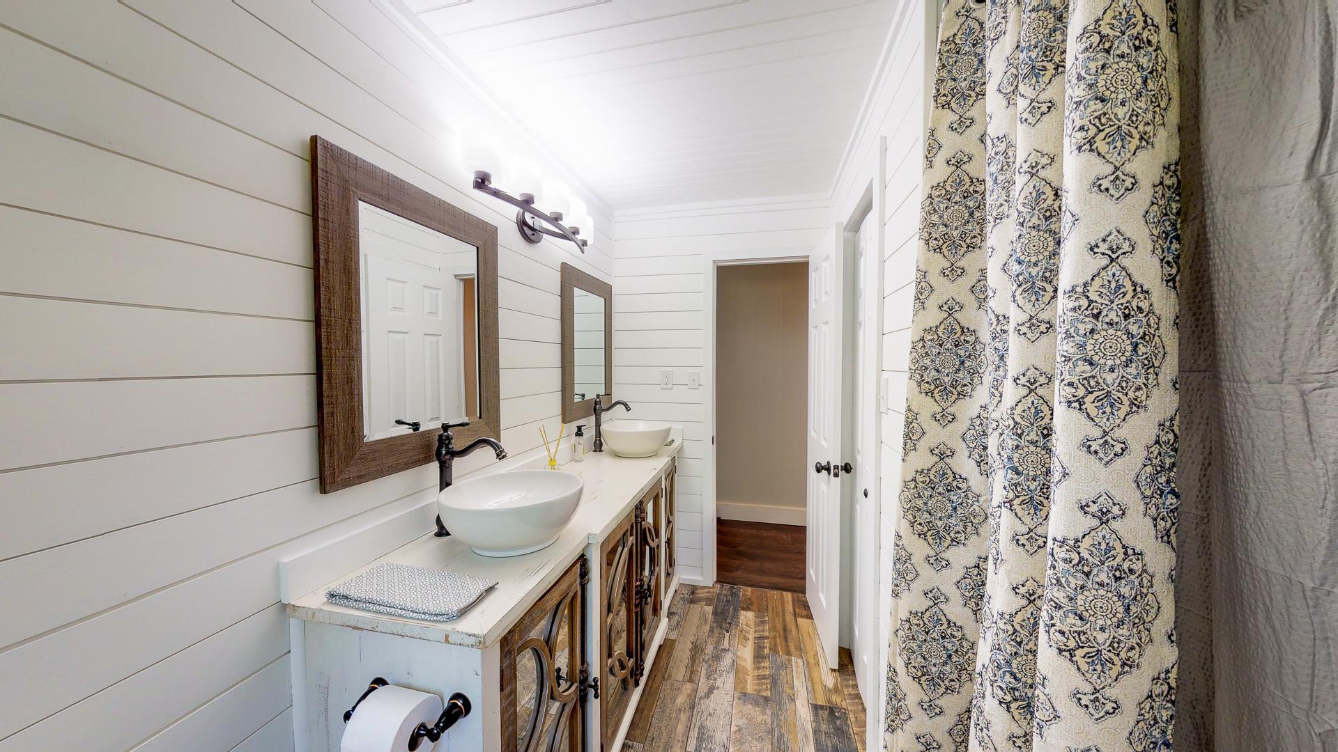 2361 Joe Brown Road Spring Hill, TN 37174 - Photo 13 of 27 a bathroom with a sink and a mirror