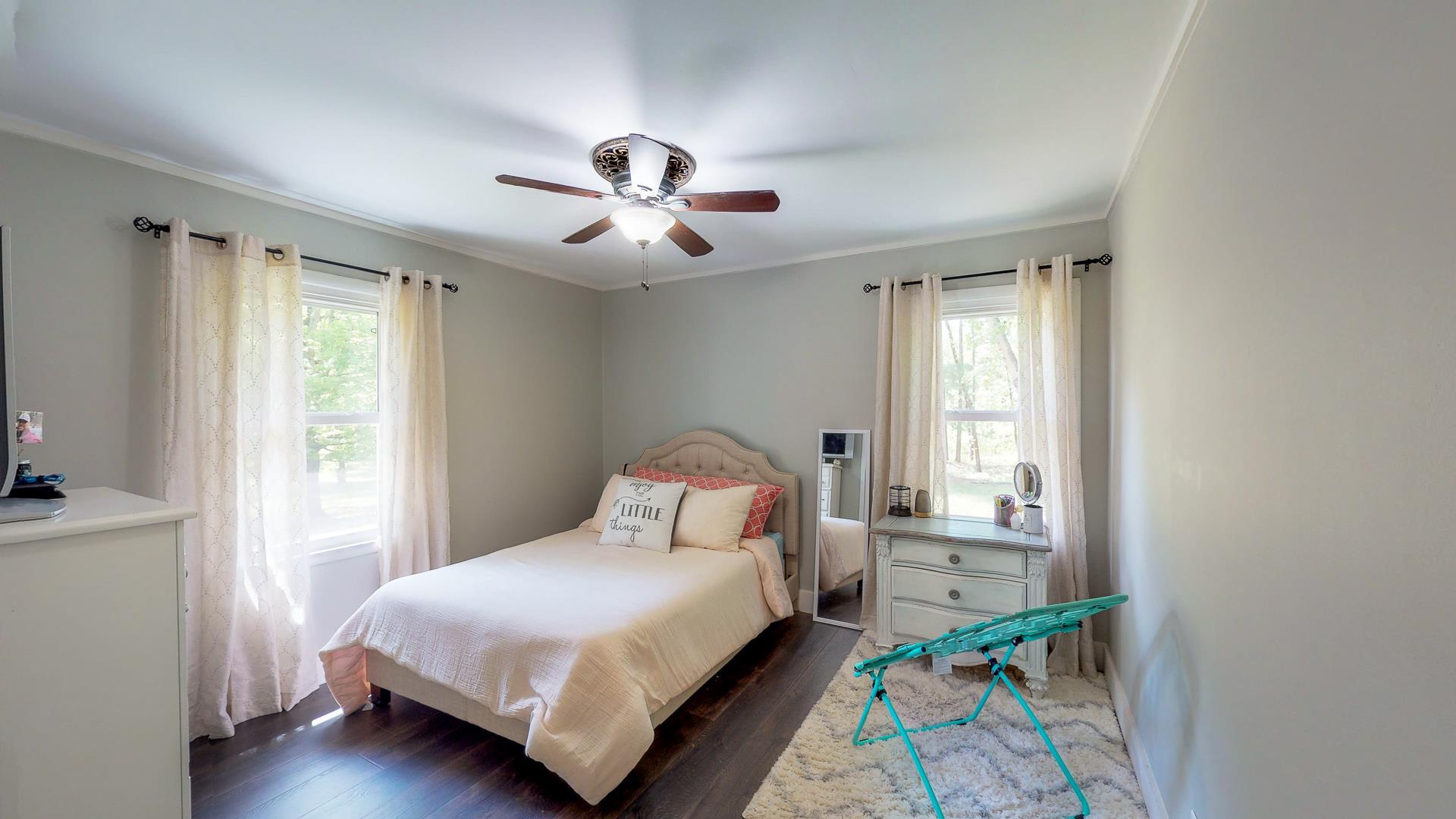 2361 Joe Brown Road Spring Hill, TN 37174 - Photo 16 of 27 a bedroom with a bed and a window