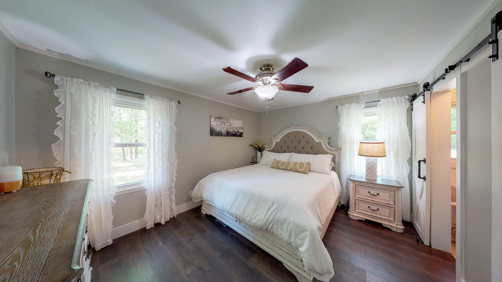 2361 Joe Brown Road Spring Hill, TN 37174 - Photo 18 of 27 a bedroom with a large bed and a window