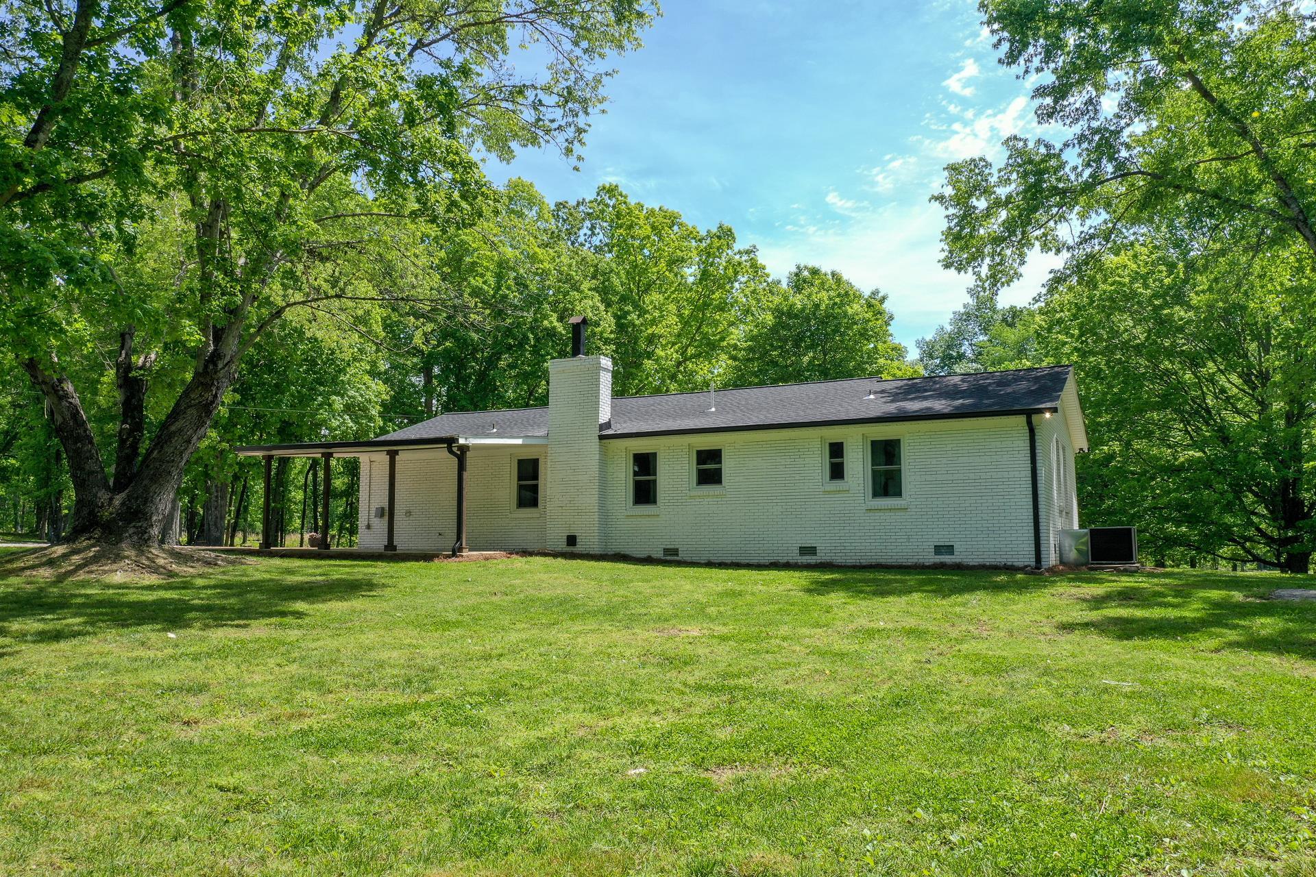 2361 Joe Brown Road Spring Hill, TN 37174 - Photo 21 of 27 a view of a house with a yard