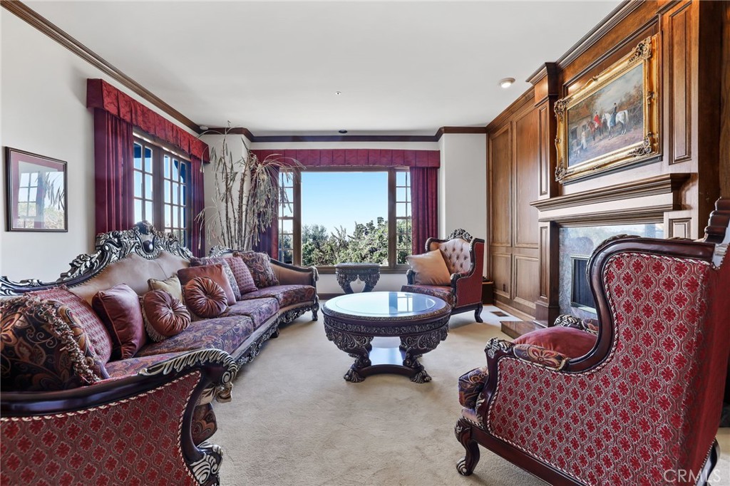 7008 Hawarden Drive Riverside, CA 92506 - Photo 12 of 37 a living room with furniture fireplace and a large window