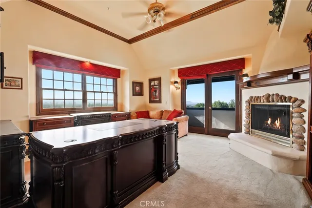 a kitchen with a stove a sink and a refrigerator