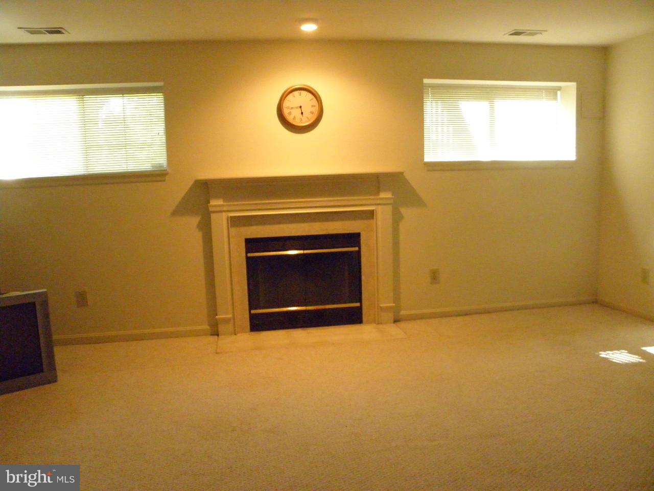 1900 Westchester Drive Silver Spring, MD 20902 - Photo 11 of 21 a view of empty room with a fireplace