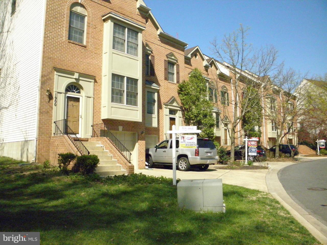 1900 Westchester Drive Silver Spring, MD 20902 - Photo 20 of 21 a view of a building with a garden and pathway