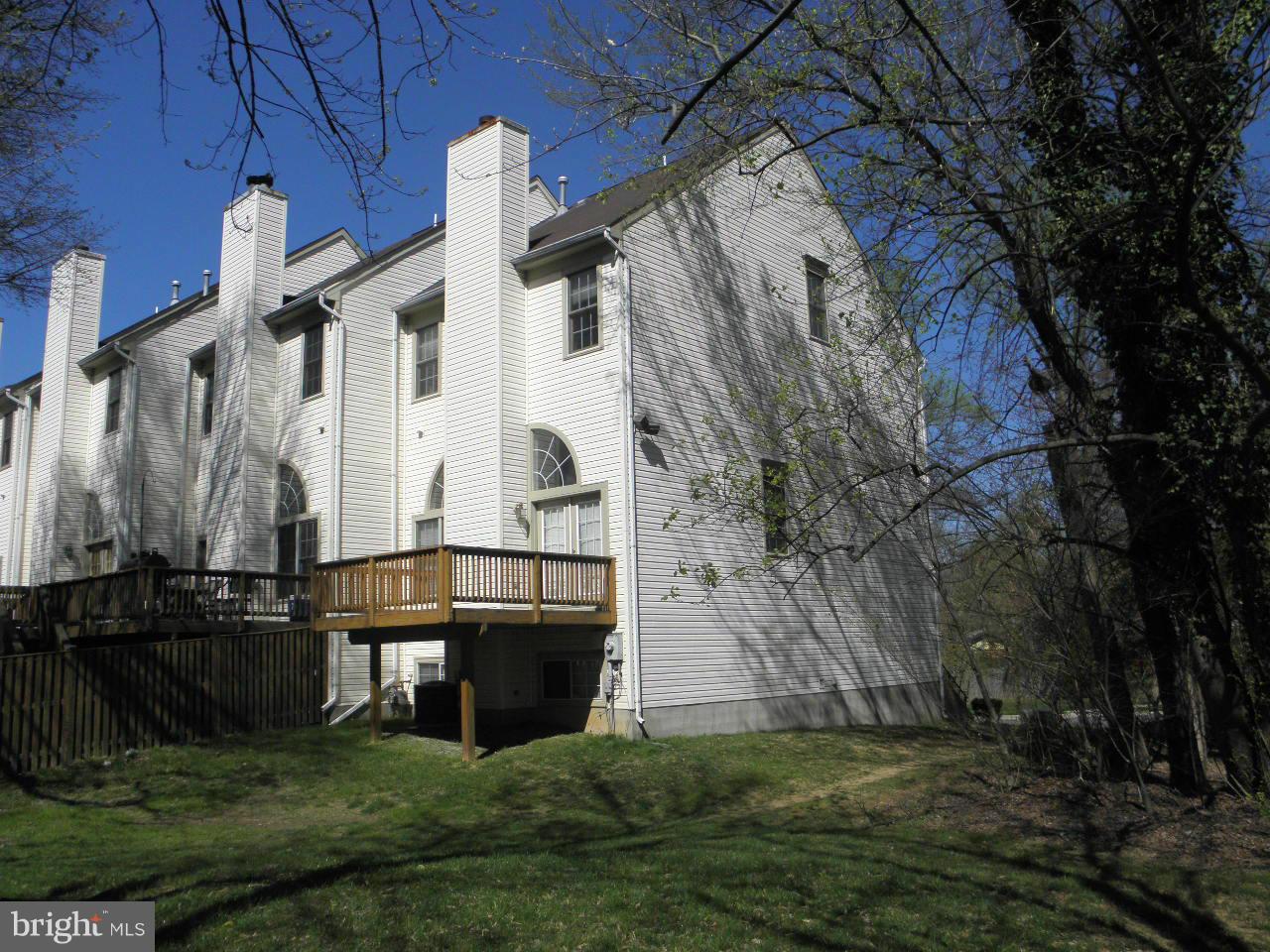 1900 Westchester Drive Silver Spring, MD 20902 - Photo 21 of 21 a front view of a house with a garden