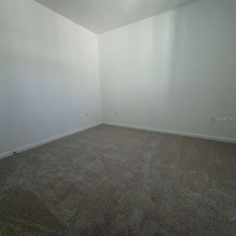 a view of hallway with stairs