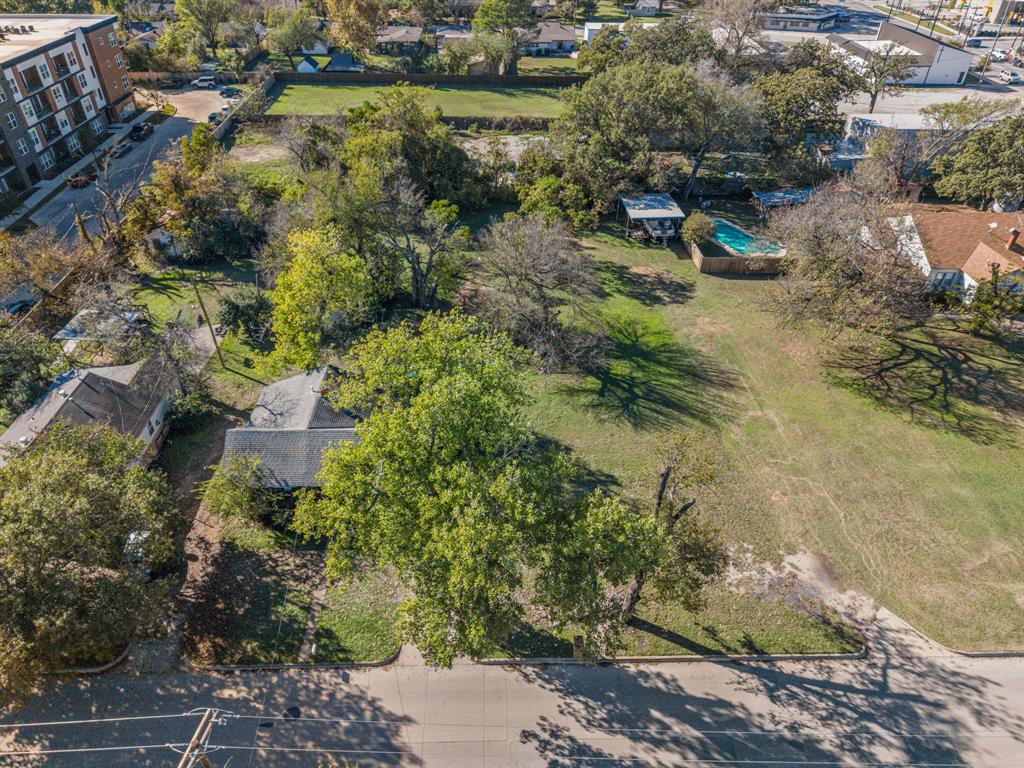 126 Athenia Drive Fort Worth, TX 76114 - Photo 11 of 21 a backyard of a house with a yard and outdoor seating