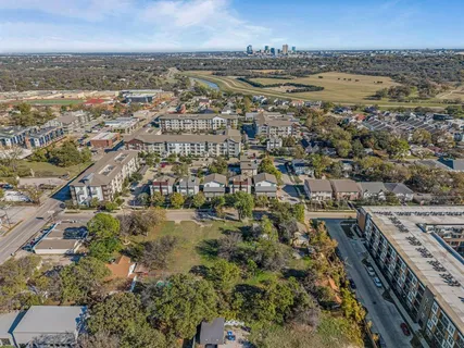 an aerial view of residential building and parking space