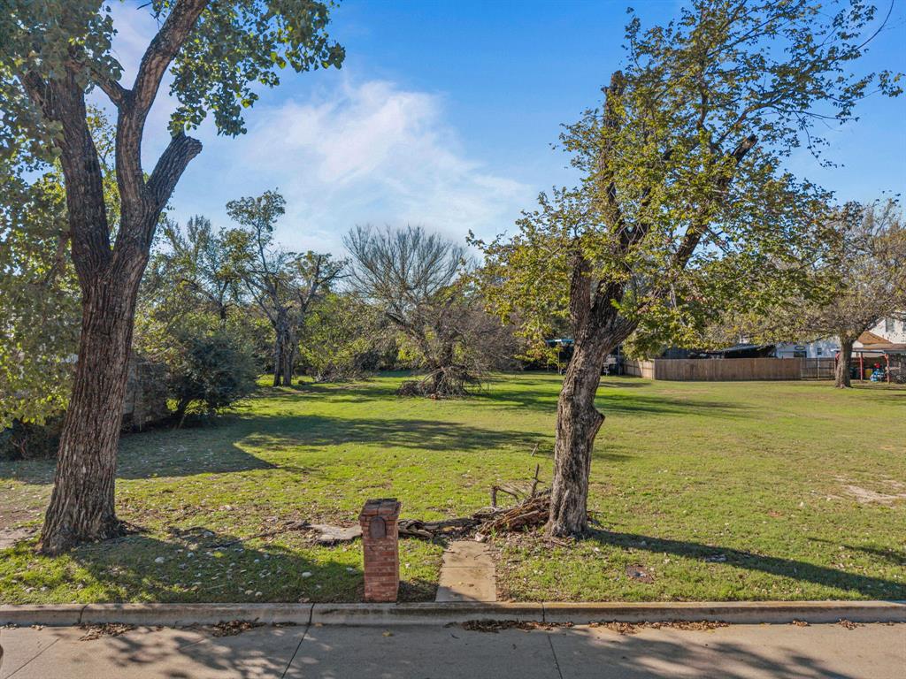 126 Athenia Drive Fort Worth, TX 76114 - Photo 7 of 21 a view of a yard with an outdoor space