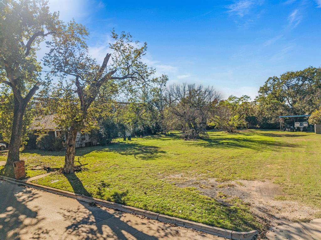 126 Athenia Drive Fort Worth, TX 76114 - Photo 8 of 21 a view of a swimming pool with an outdoor space