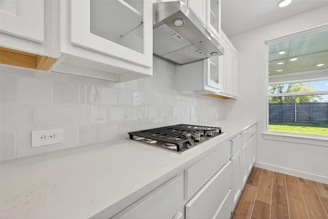 a view of a garden with an outdoor space