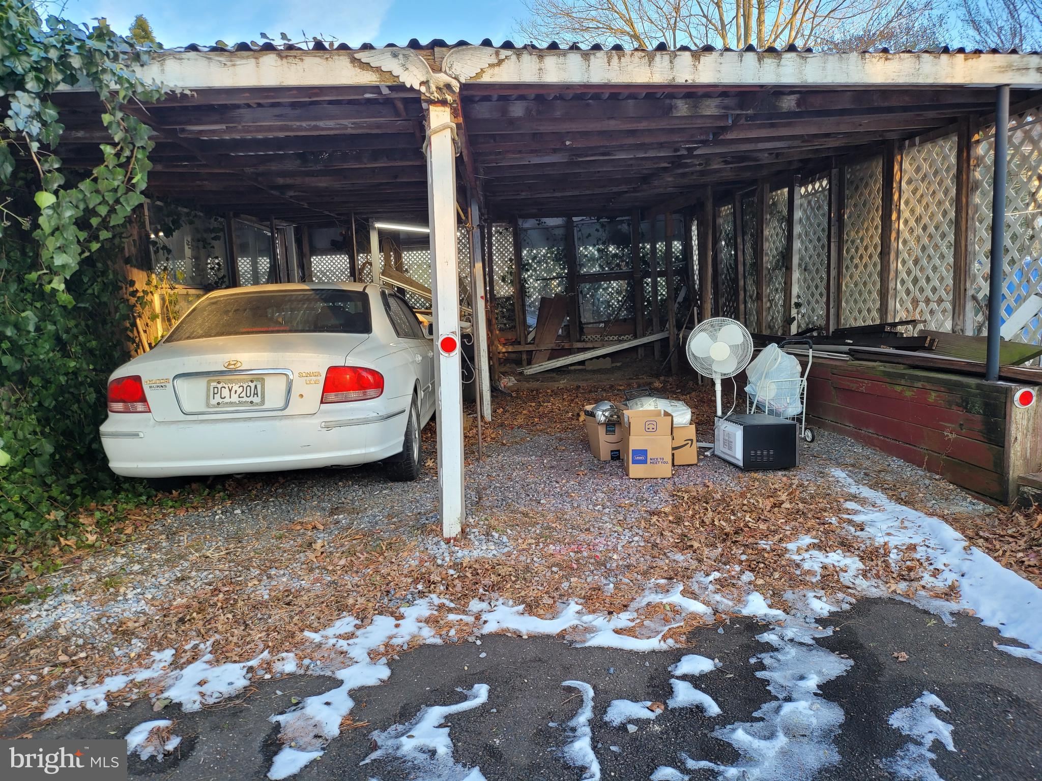 15 Shepherd Road Cherry Hill, NJ 08034 - Photo 16 of 21 a view of a back yard of the house and cars parked