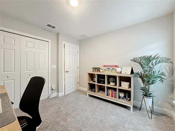 a room with furniture and a chair