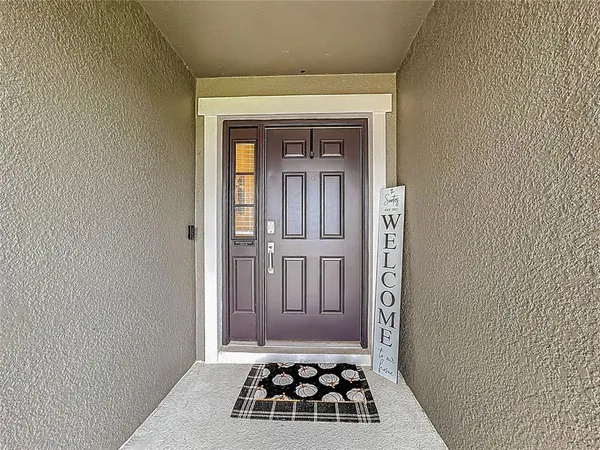 a view of a door and a bathroom
