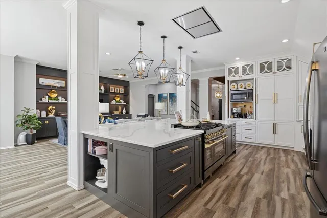 a spacious bathroom with a sink double vanity and a shower