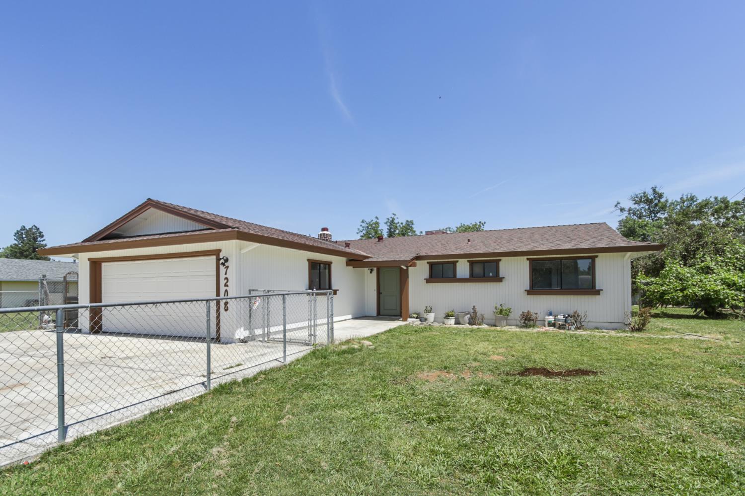 a view of house with outdoor space