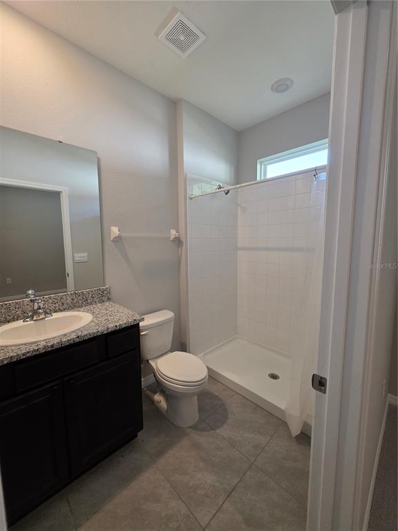8059 Southwest 57th Court Ocala, FL 34476 - Photo 19 of 36 a bathroom with a sink and a mirror