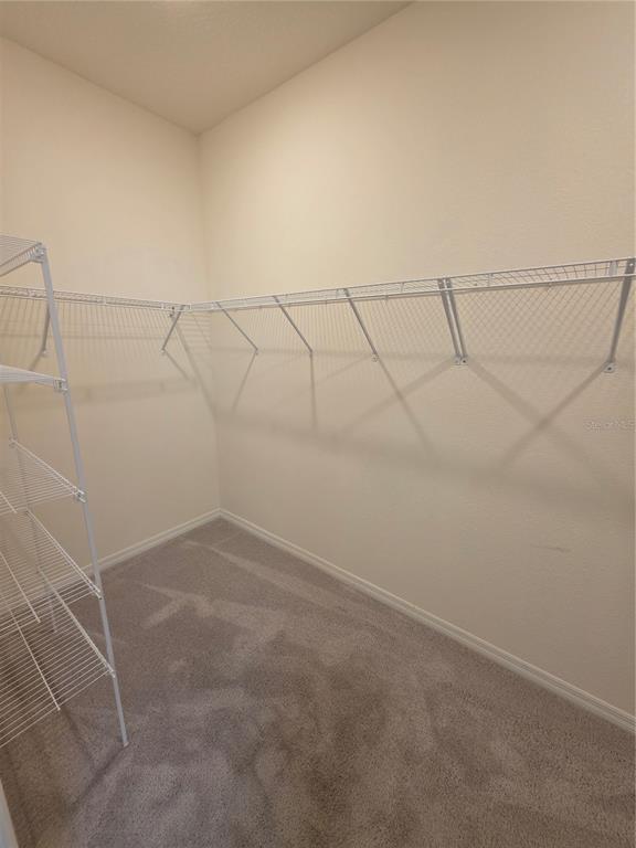8059 Southwest 57th Court Ocala, FL 34476 - Photo 30 of 36 a view of a room with racks on the wall