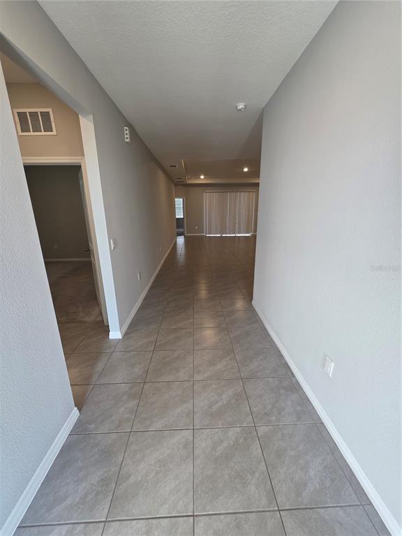 8059 Southwest 57th Court Ocala, FL 34476 - Photo 3 of 36 a view of a hallway