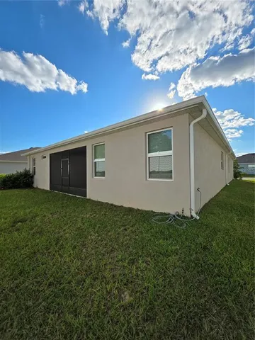 a view of a house with a garden