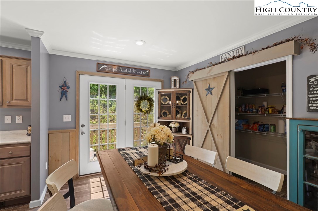 565 Valley Road Spruce Pine, NC 28777 - Photo 13 of 39 a living room with furniture and a window