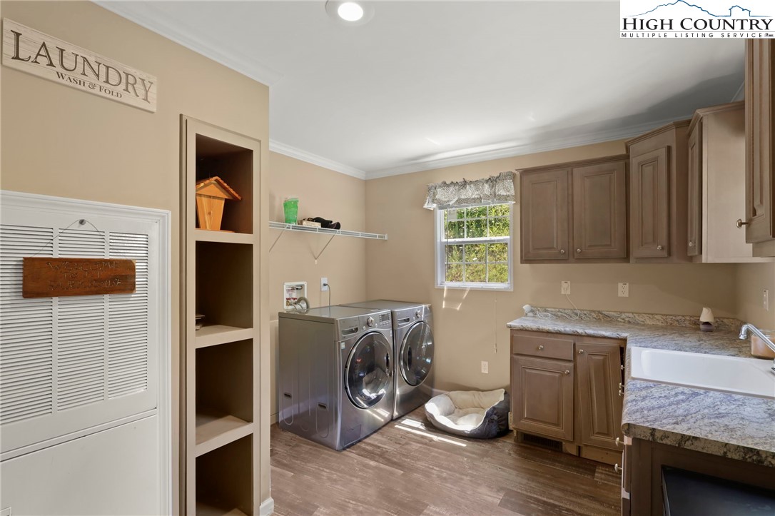 565 Valley Road Spruce Pine, NC 28777 - Photo 33 of 39 a kitchen with a refrigerator and a sink