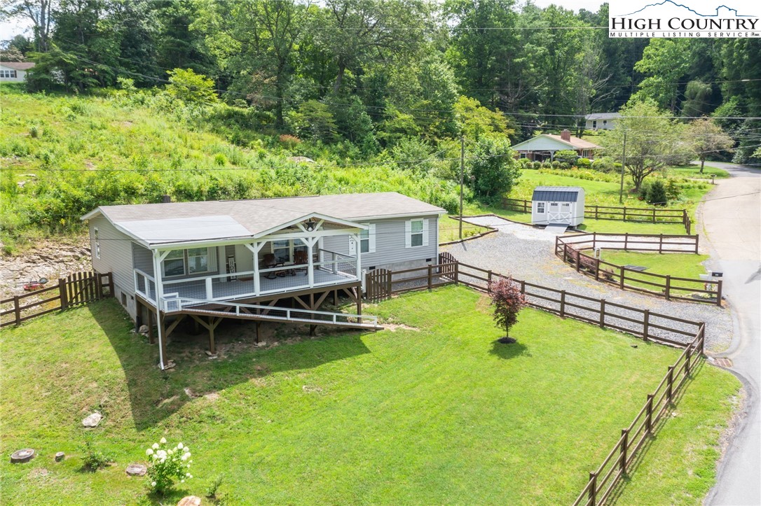 565 Valley Road Spruce Pine, NC 28777 - Photo 36 of 39 an aerial view of a house with swimming pool