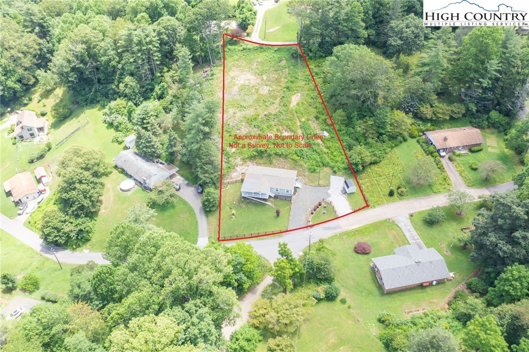 565 Valley Road Spruce Pine, NC 28777 - Photo 37 of 39 an aerial view of a residential houses with outdoor space